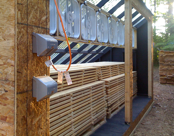 Passive solar kiln designed and build specially for hybrid timberframe project.
